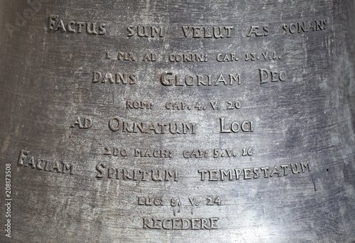 Gniezno, inscription on the cracked, old bell by the cathedral. photo