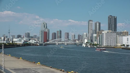 TAKESHIBA,  TOKYO,  JAPAN - CIRCA JUNE 2018 : Scenery of BUILDINGS and RIVER SUMIDA at CHUO WARD .  View from TAKESHIBA area. photo