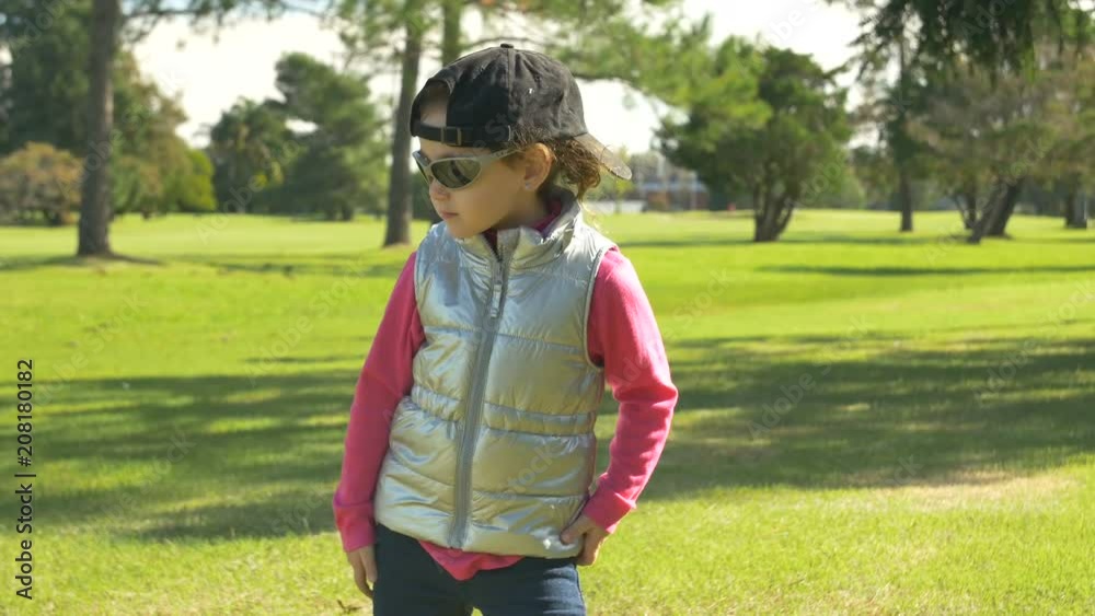 Little Girl Dancing outdoors park, green, meadow Little Girl Dancing outdoors park, green, meadow