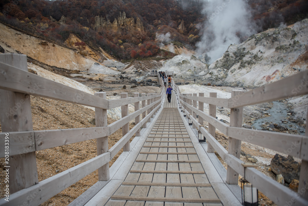 Jigokudani or Hell Valley in the town of Noboribetsu Onsen, hot steam vents, sulfurous streams and other volcanic activity, hot spring waters, Hokkaido, Japan.