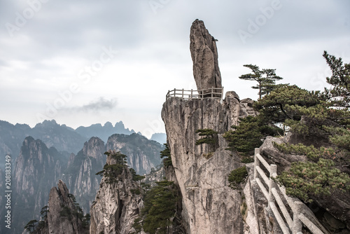 Flying Over Stone on Yellow Mountain, natural mountain stone sculptures and cliffs, Huangshan mountain, East China`s Anhui Province. photo