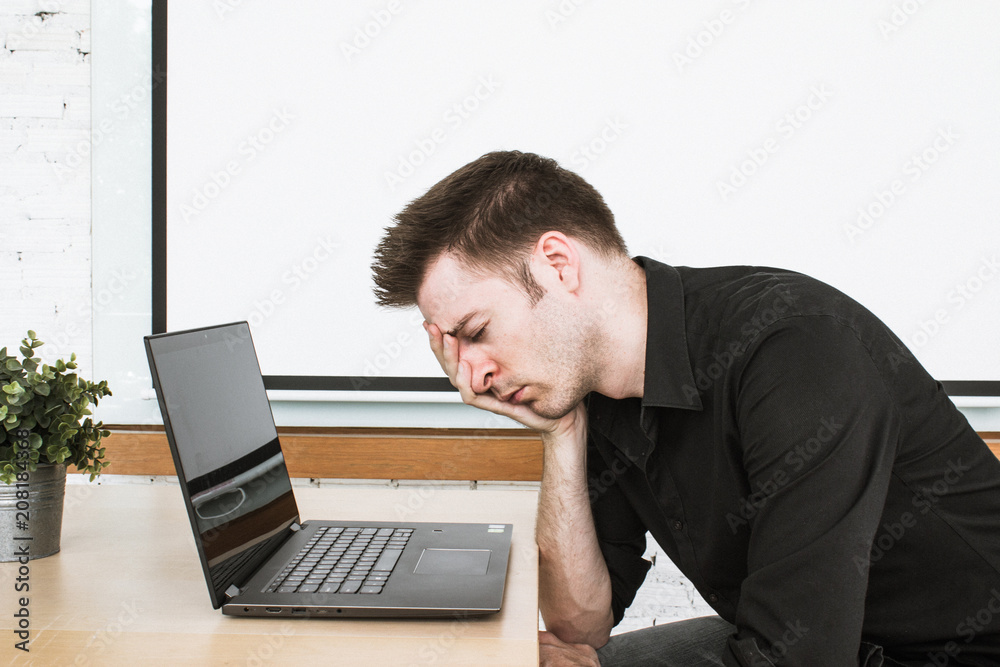 Low energy is coffee time for office worker on laptop. Low energy is coffee time for office worker on laptop.
