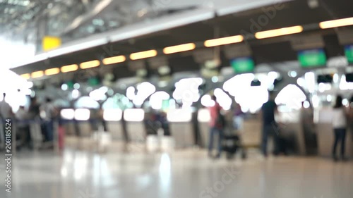 Wallpaper Mural Blurred footage of passengers walking to check-in counter at International airport terminal. 4K video with defocused effect. Torontodigital.ca