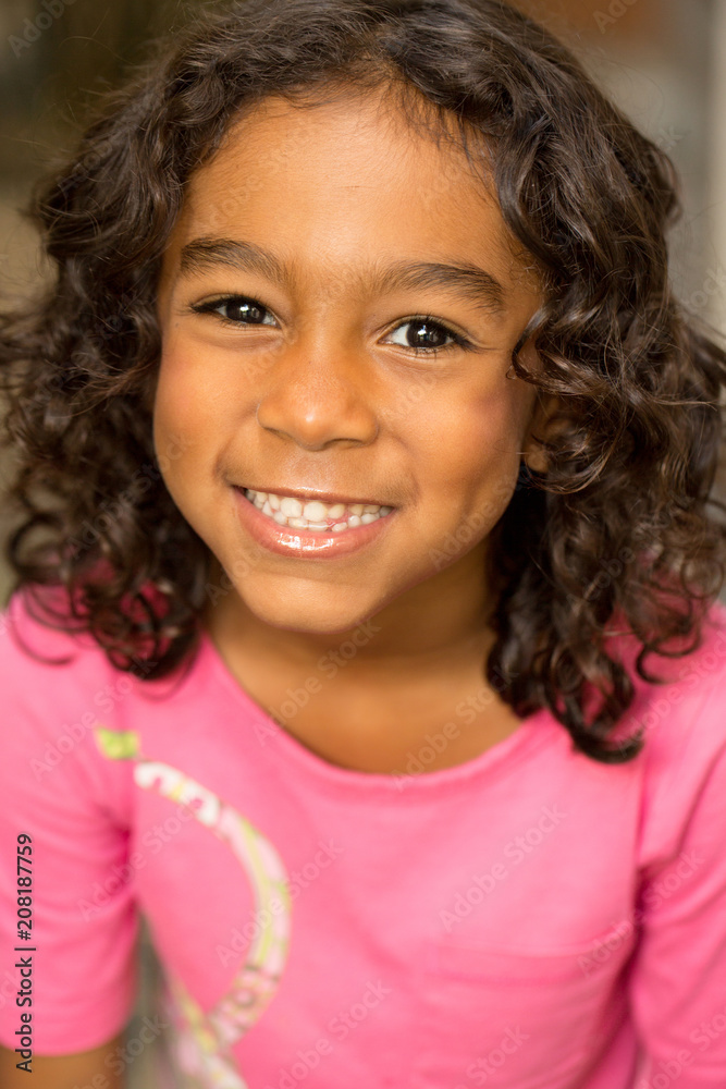 Cute hispanic little girl smiling. Cute hispanic little girl smiling.