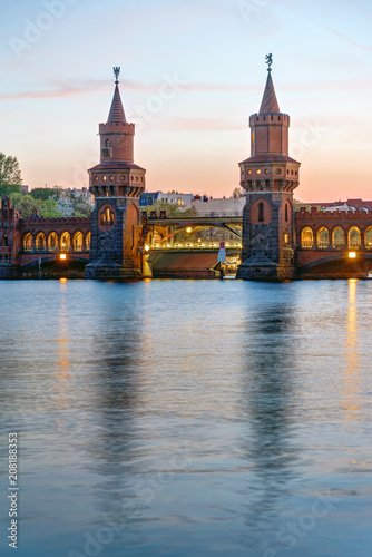 The Oberbaumbridge and the river Spree in Berlin after sunset