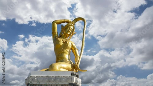 The large gold statue of Phra Mae Thorani is built on the belief of Southeast Asia in Thailand. timelapse photo