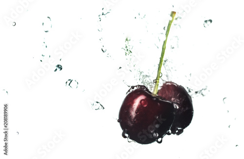 Fresh and juicy cherry fruit served in a splash of water