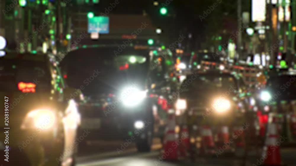 ROPPONGI, TOKYO, JAPAN - CIRCA JUNE 2018 : TAXI and CAR passing at night time in busy street around Roppongi crossing area. In blurred. ROPPONGI, TOKYO, JAPAN - CIRCA JUNE 2018 : TAXI and CAR passing at night time in busy street around Roppongi crossing area. In blurred.