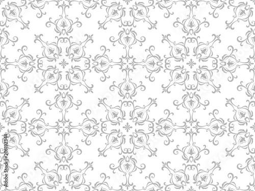 Wallpaper in the style of Baroque. A seamless vector background. White and grey floral ornament. Graphic vector pattern.