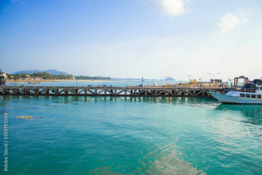 The fishing pier and ferry boats. On the island.