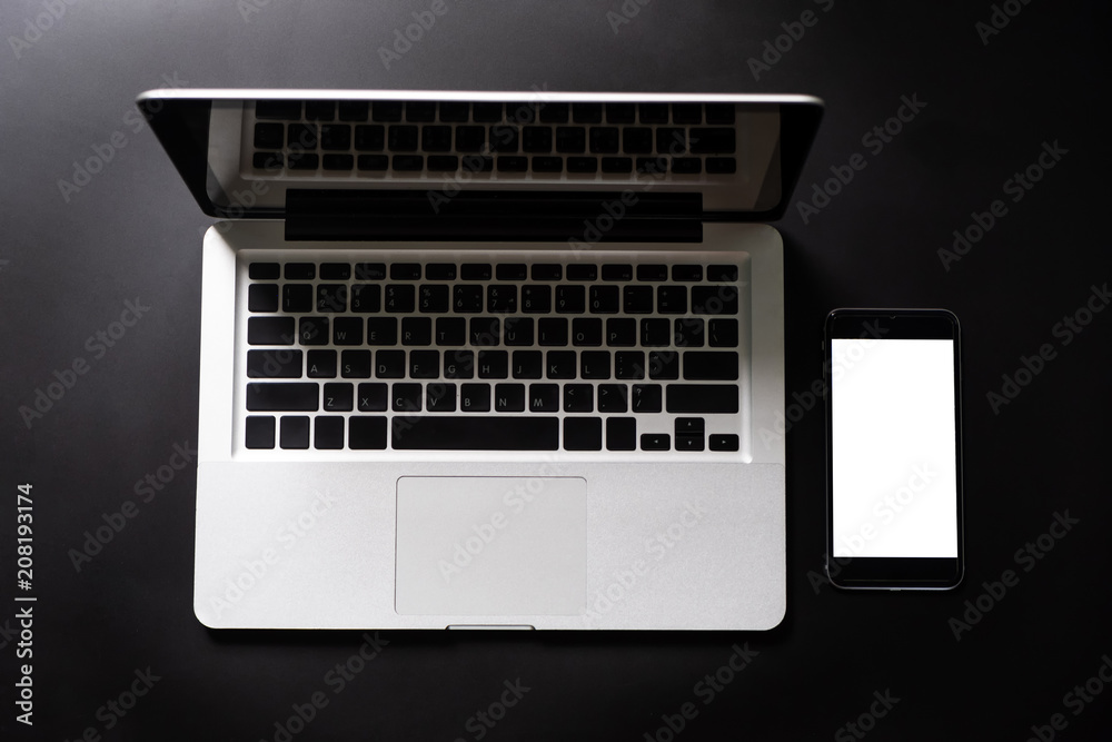 Fototapeta premium Laptop , tablet and smart phone .on table. Modern digital devices and gadgets.
