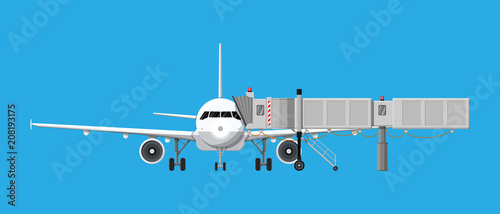 Aero bridge or jetway with aircraft photo