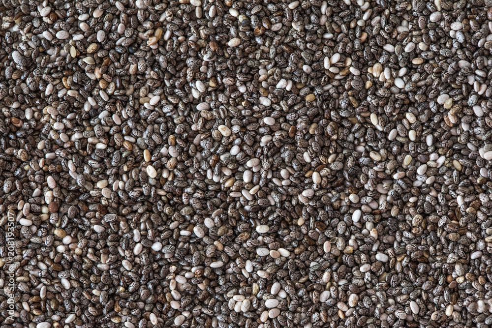 Chia seeds Background, close up. Black Chia Pattern. Healthy diet concept. Copy space. Chia seeds Background, close up. Black Chia Pattern. Healthy diet concept. Copy space.