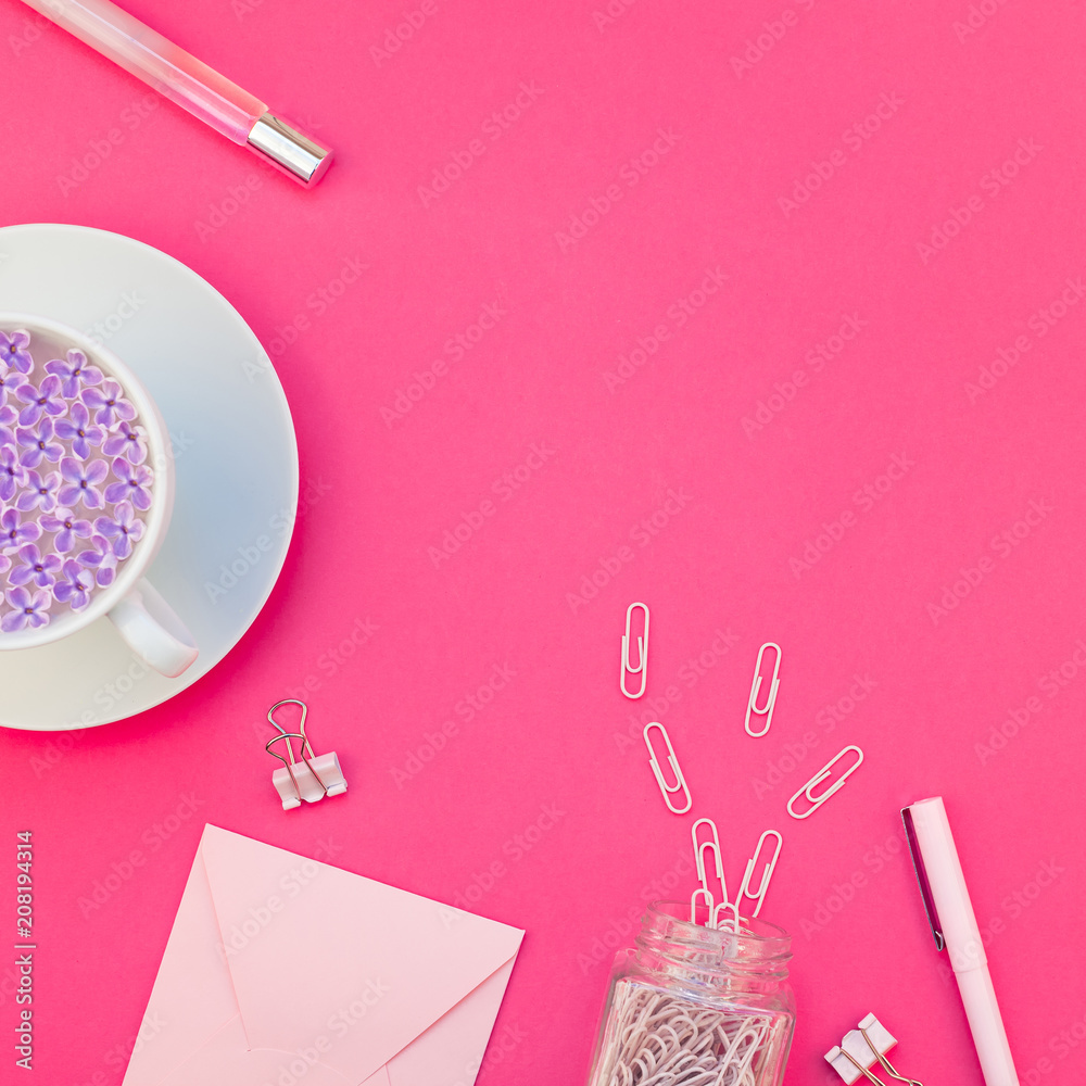 Styled pink feminine workspace flat lay