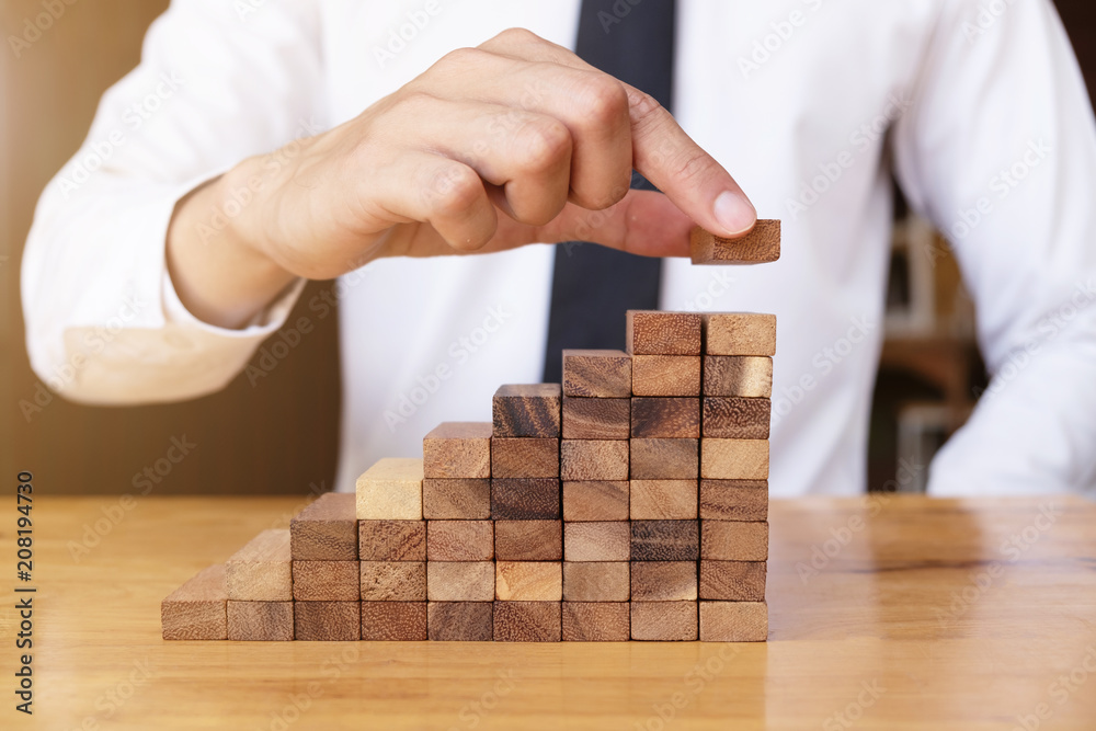 The way planning for business growth with wooden blocks The way planning for business growth with wooden blocks