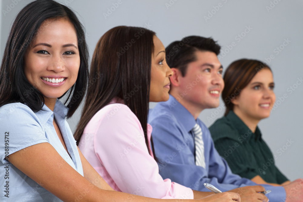Group of business people in a meeting. Group of business people in a meeting.