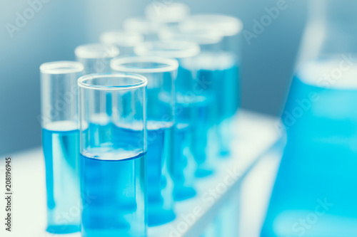 Science Chemical in glass tube blue color in research lab for sci background concept.