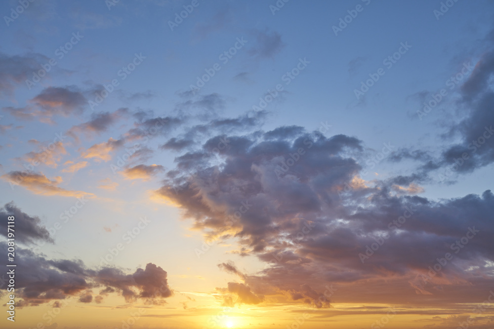 Sunset with clouds, light rays and other atmospheric effect
