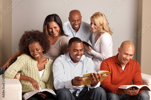 Diverse group of friends reading.