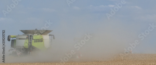 COMBINE HARVESTERS - Agricultural machinery on the field
