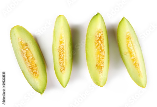 Fresh cantaloupe melon slices isolated on white background, top view