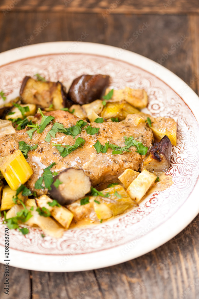 Pork steak with leeks and aubergine