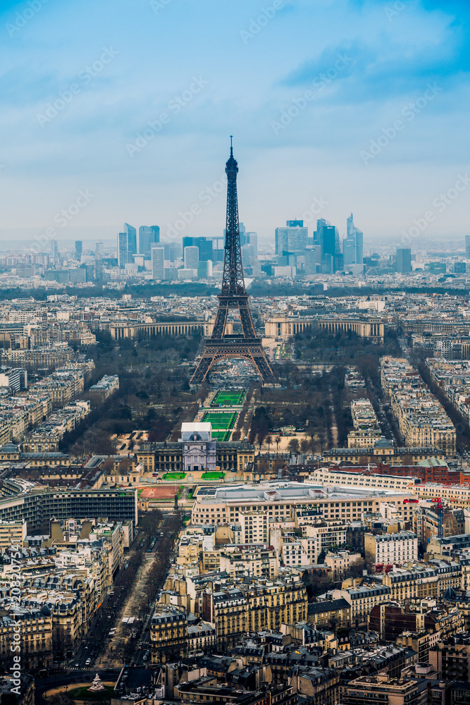 Aerial cityscape of Paris, France, with the Eiffel tower seen from the Tour Montparnasse Aerial cityscape of Paris, France, with the Eiffel tower seen from the Tour Montparnasse