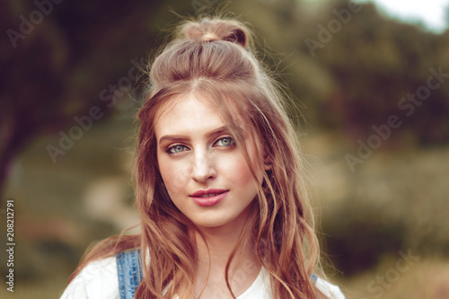 Outdoors portrait of beautiful young girl