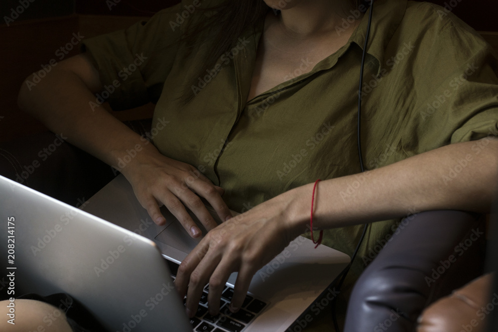 Girl using her laptop in a cafe. Girl using her laptop in a cafe.