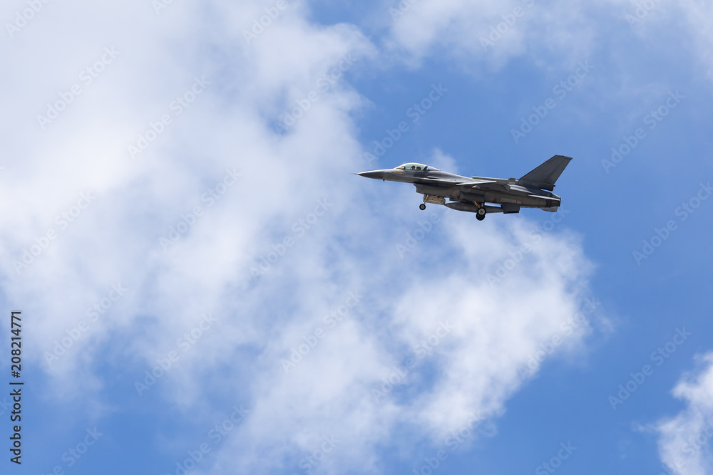 f16 falcon fighter jet on sky background