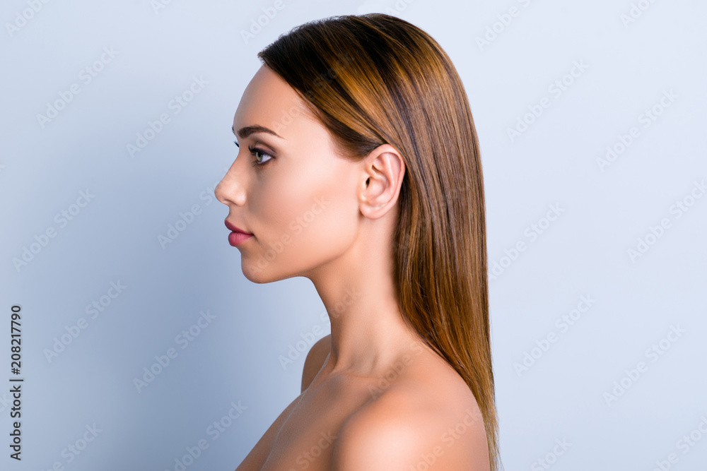 Trend dermatology purity medicine lotion ear rhinoplasty nose wellness concept. Profile portrait of beautiful woman with ideal smooth nourished hairdo isolated gray background Trend dermatology purity medicine lotion ear rhinoplasty nose wellness concept. Profile portrait of beautiful woman with ideal smooth nourished hairdo isolated gray background