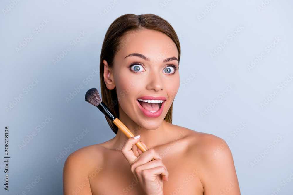Fototapeta premium Shiny ideal perfect lady silky eyelashes artist girlish feminine nude concept. Portrait of excited astonishedl lady using perfect brush for makeup isolated on grey background