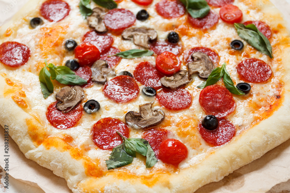 Assorted pizza with different fillings served on wooden table with ingredients Assorted pizza with different fillings served on wooden table with ingredients