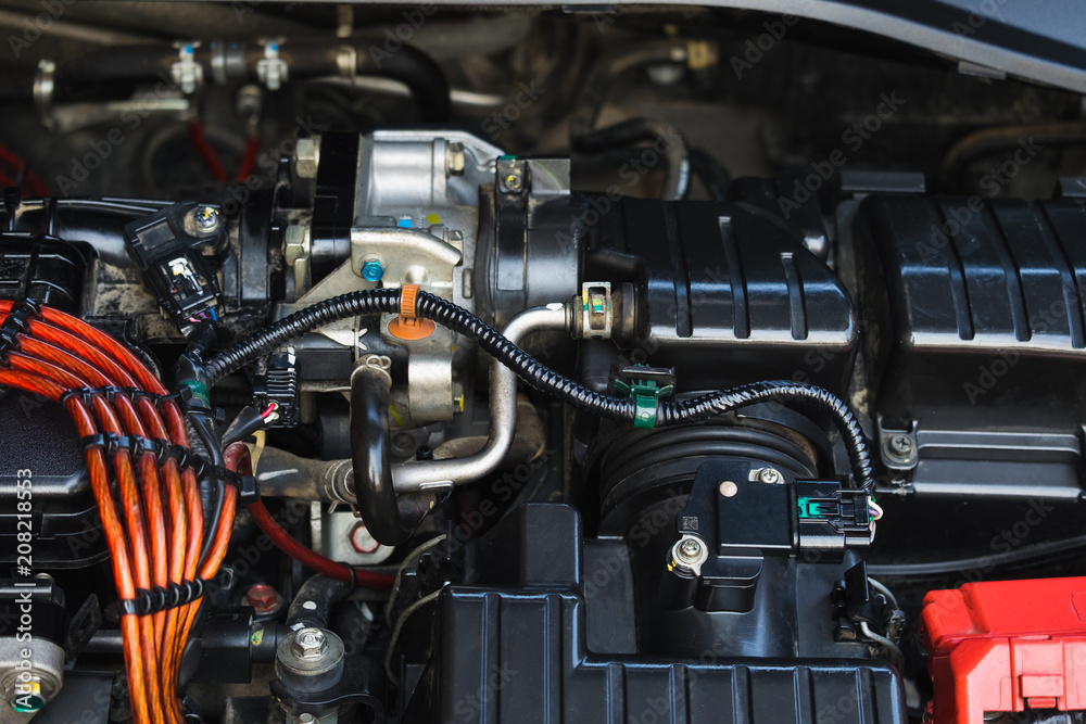 Close up detail of clean car engine with red wire. Close up detail of clean car engine with red wire.