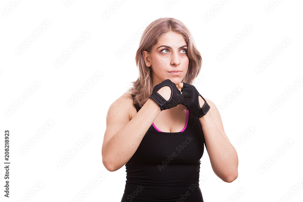 Fit woman in sport clothes practicing sport in studio photo over white background Fit woman in sport clothes practicing sport in studio photo over white background