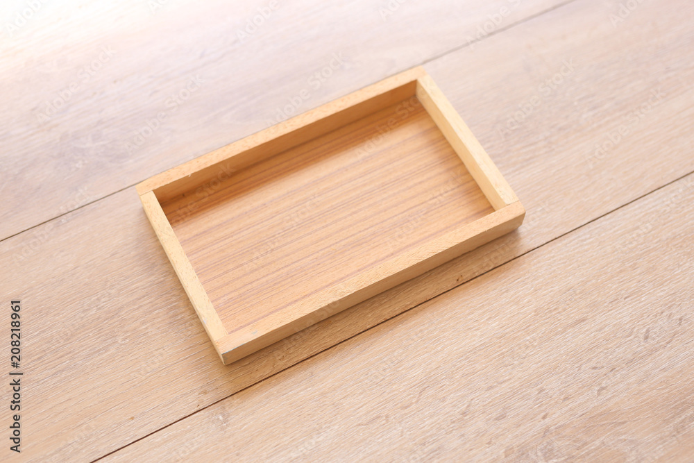 Wooden box on Wood Background, top view.