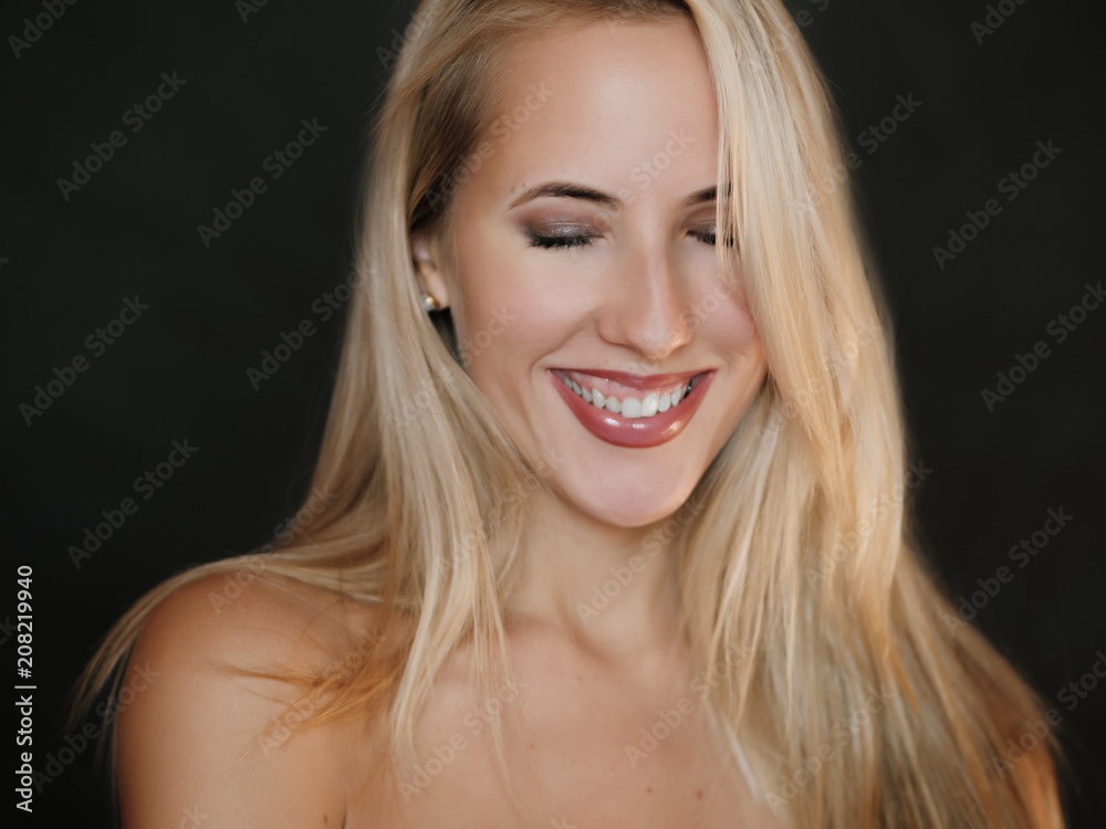 Portrait of beautiful sensual woman with green eyes. Studio shot. Portrait of beautiful sensual woman with green eyes. Studio shot.