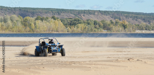 Buggy racing on the sand beach