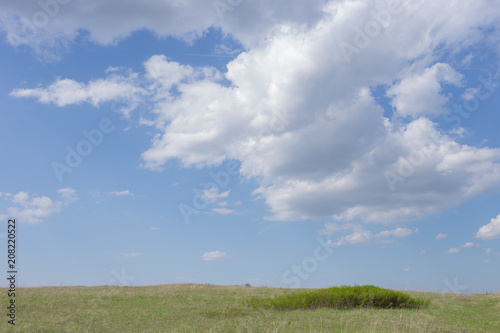 summer blue sky with clouds at field background