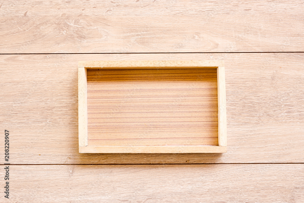 Wooden box on Wood Background, top view. Wooden box on Wood Background, top view.