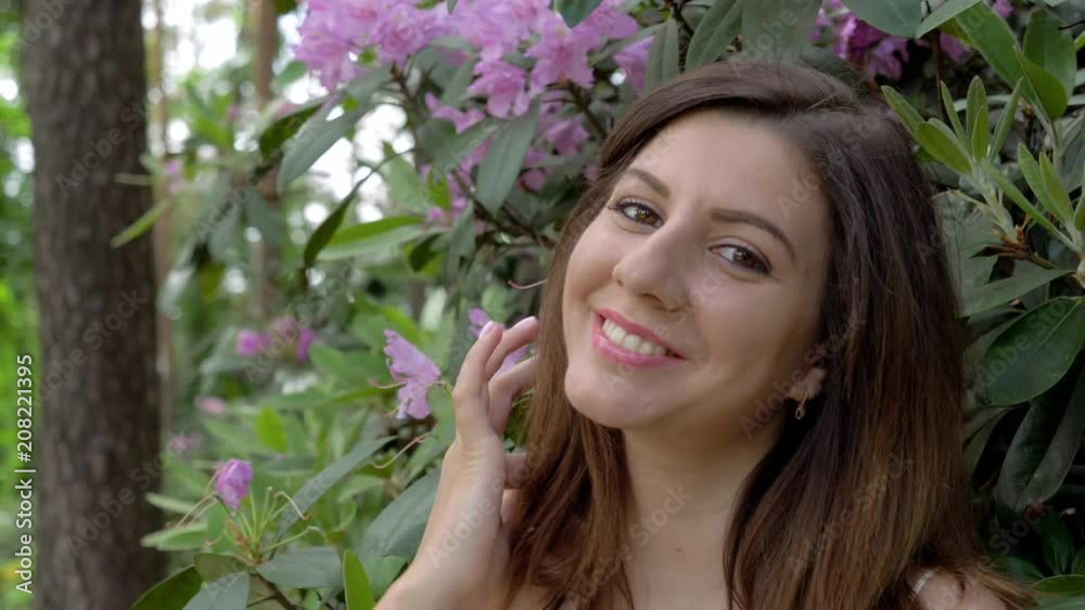 Closeup Portrait Of A Young Happy Beauty Woman Looking At The Camera And Smiling Closeup Portrait Of A Young Happy Beauty Woman Looking At The Camera And Smiling