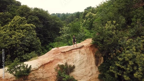 Trail running in a canyon drone video