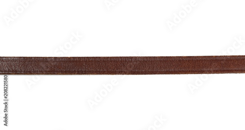 Old, brown leather belt, strap isolated on white background