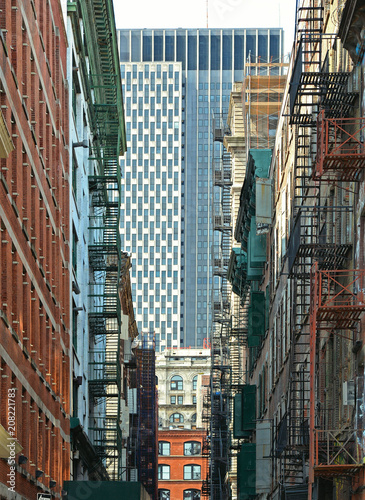 old colorful classic buildings, facade, architecture, balcony and windows in Soho, Downtown Manhattan