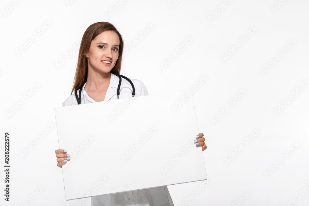 doctor in white uniform holding blank board doctor in white uniform holding blank board