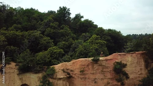 Trail running in a canyon drone video