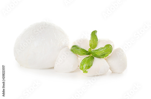 Mozzarella cheese and basil on white background