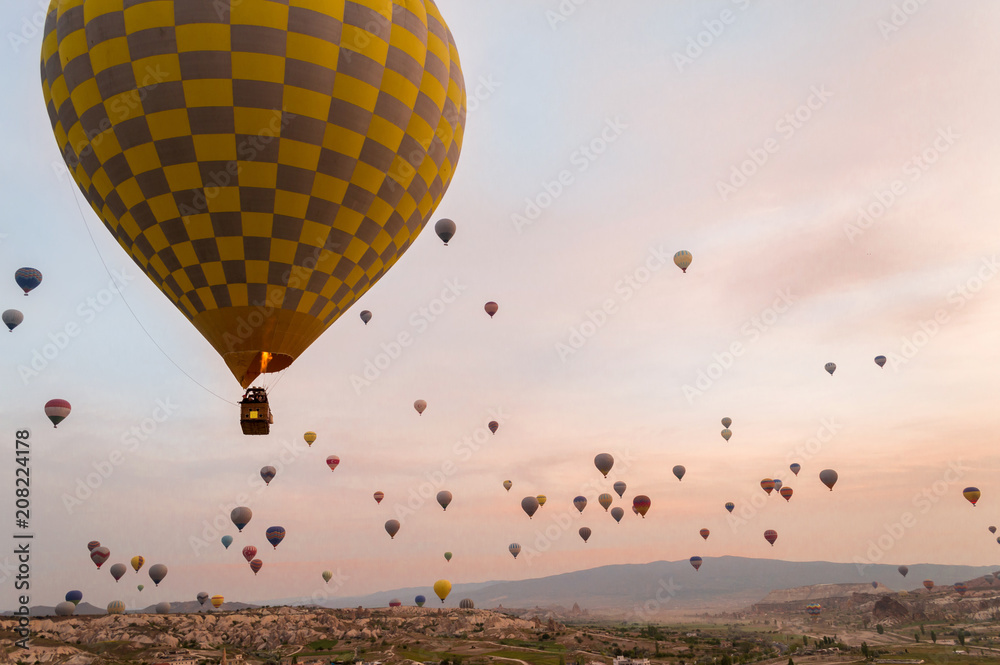 Fototapeta premium front view of hot air balloons flying over valley of Cappadocia, Turkey