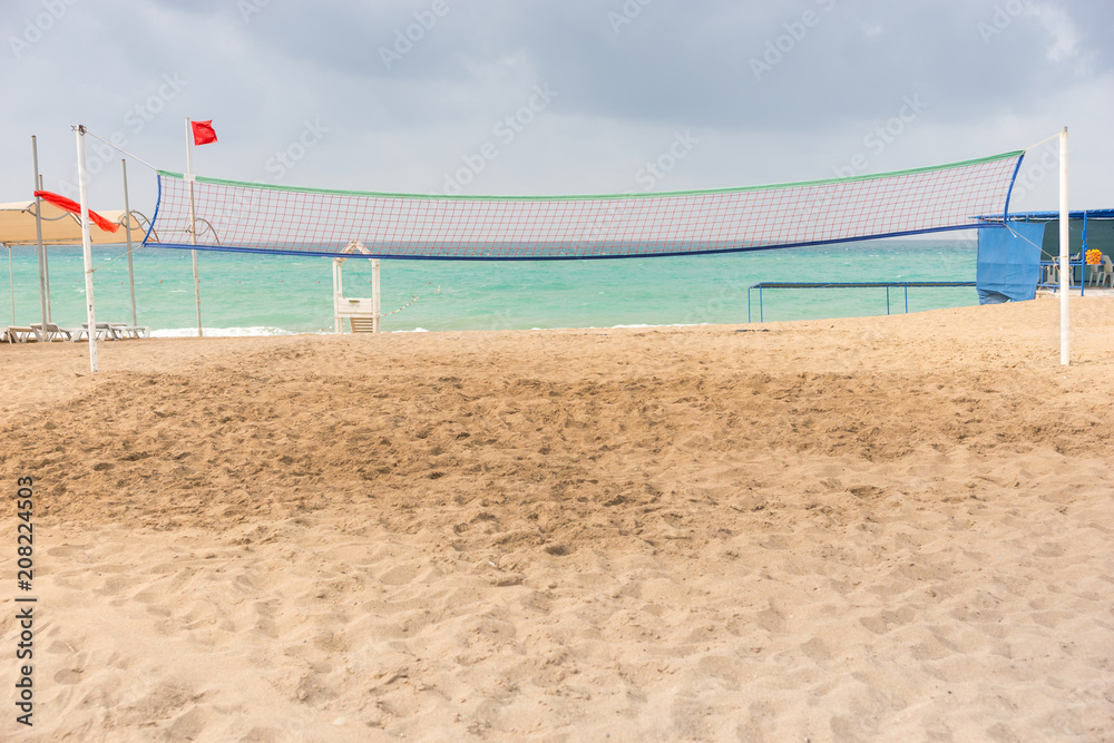 Volley ball net on a sandy tropical beach Volley ball net on a sandy tropical beach