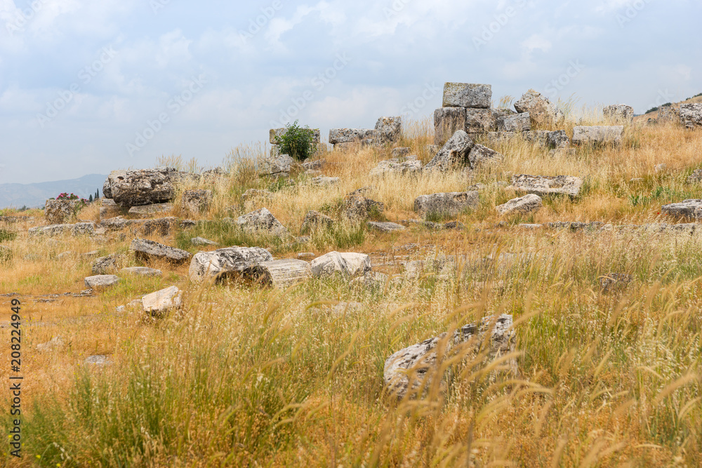 Scattered remnants of ruined stone buildings